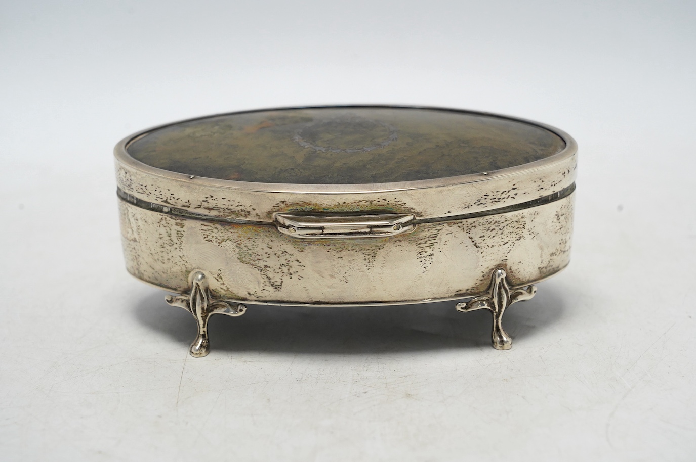 A George V silver and tortoiseshell mounted oval manicure box, E.S. Barnsley & Co Ltd, Birmingham, 1912, 13.5cm, incomplete. Condition - poor